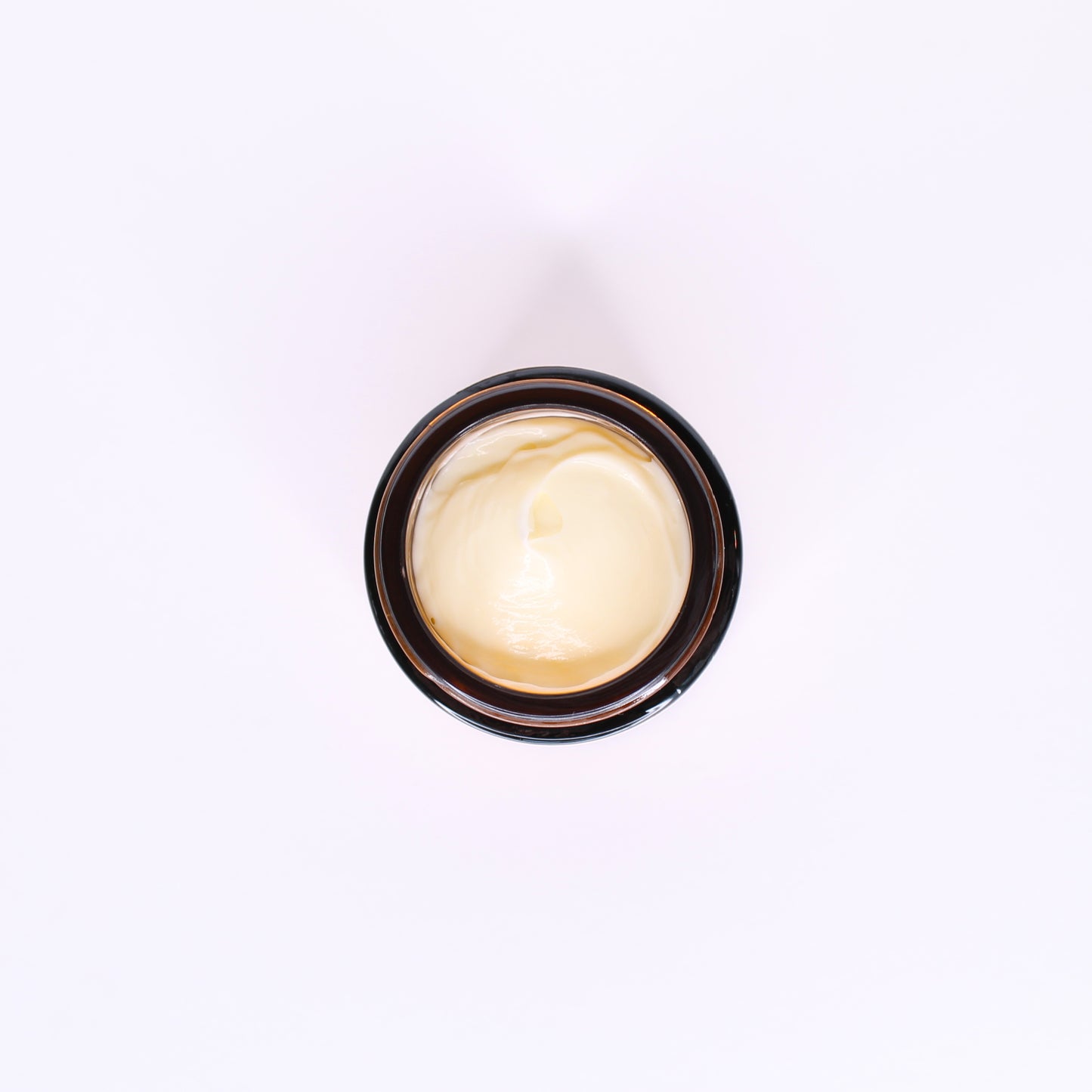 Ceramide Veil facial moisturizer, top view, light buttery yellow cream